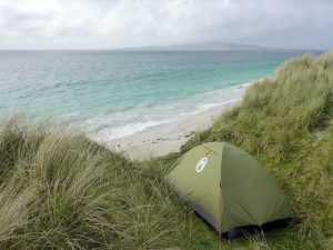 24 Tent in hollow, Pabbay in distance